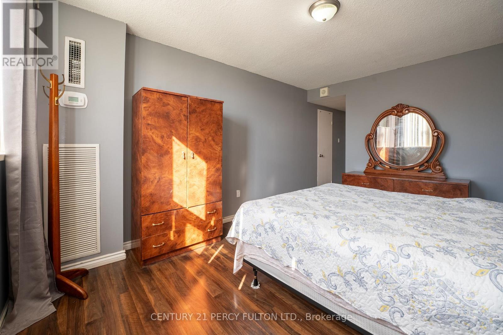 301 - 25 Silver Springs Boulevard, Toronto, ON - Indoor Photo Showing Bedroom