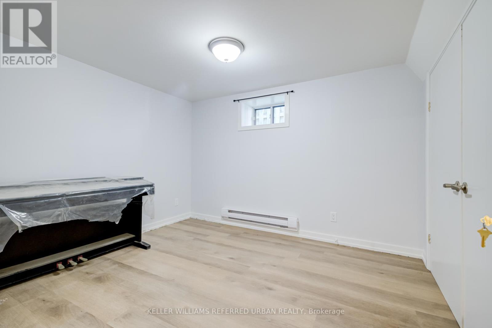 Lower - 2556 Lake Shore Boulevard W, Toronto, ON - Indoor Photo Showing Other Room