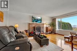 Living room with wood-burning fireplace -