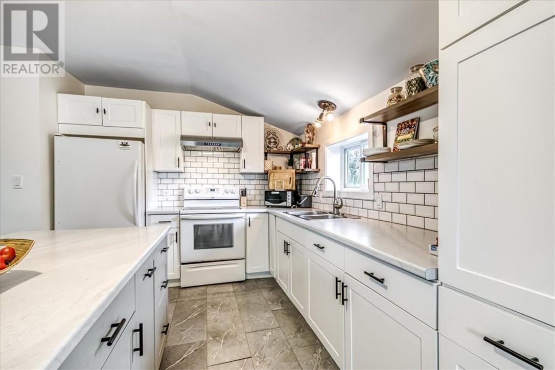 2906 Main Street, Blezard Valley, ON - Indoor Photo Showing Kitchen With Double Sink
