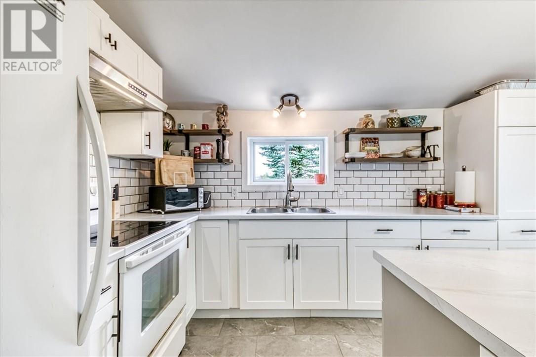 2906 Main Street, Blezard Valley, ON - Indoor Photo Showing Kitchen With Double Sink