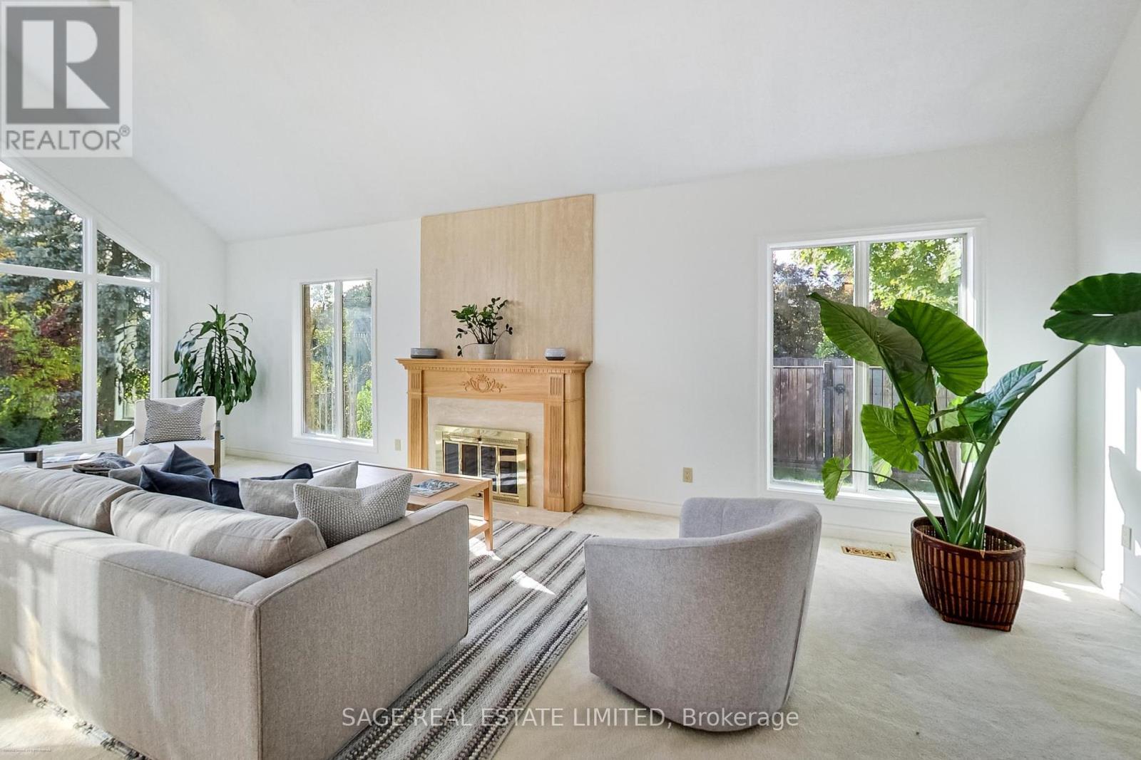 4143 Tapestry Trail, Mississauga, ON - Indoor Photo Showing Living Room With Fireplace