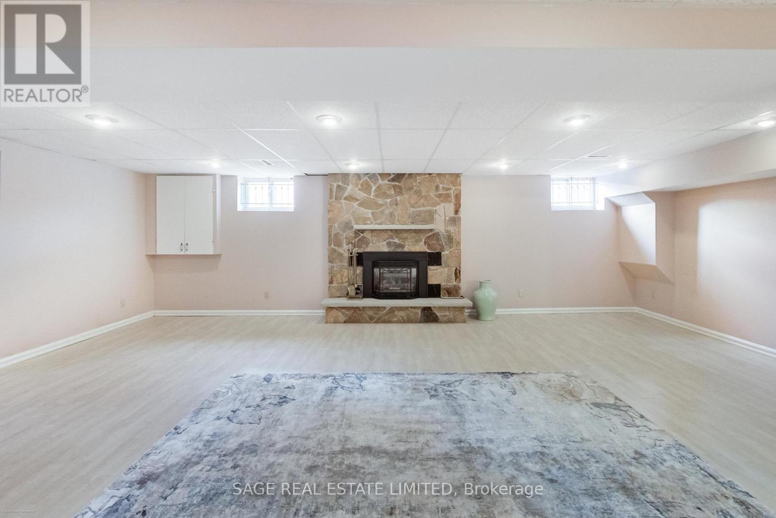 4143 Tapestry Trail, Mississauga, ON - Indoor Photo Showing Basement With Fireplace