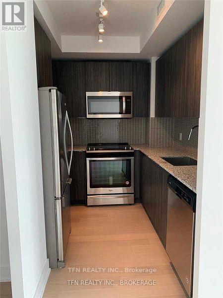 337 - 30 Shore Breeze Drive, Toronto, ON - Indoor Photo Showing Kitchen