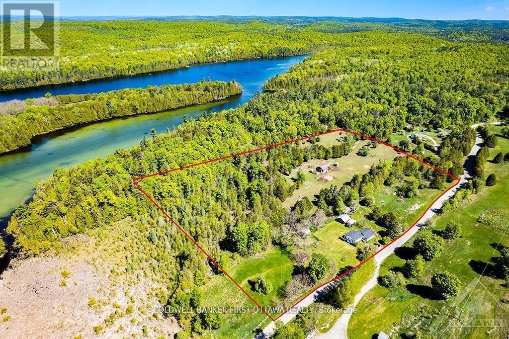 2523 Canonto Road, Frontenac (Frontenac North), ON - Outdoor With Body Of Water With View