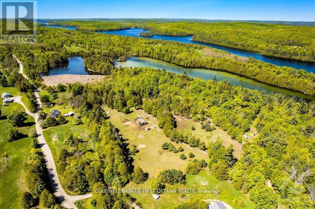 2523 Canonto Road, Frontenac (Frontenac North), ON - Outdoor With Body Of Water With View