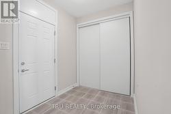 Mud Room with Garage Acess, Ceramic Tile -