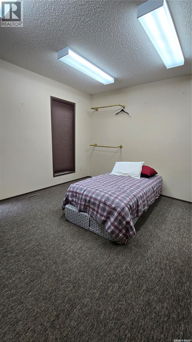 108 1St Street W, Carnduff, SK - Indoor Photo Showing Bedroom