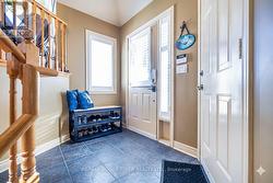 Spacious Main Floor Hall with Garage Access -