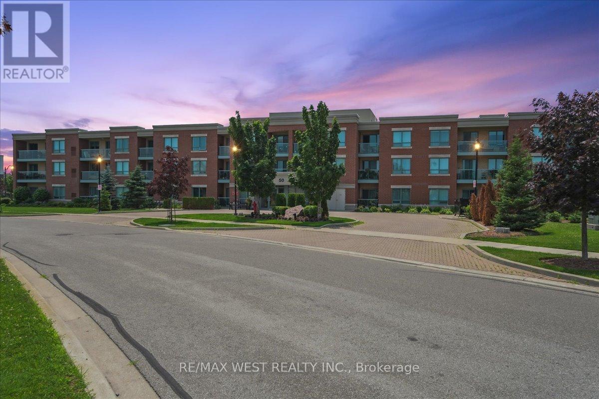 117 - 50 Via Rosedale, Brampton, ON - Outdoor With Balcony With Facade