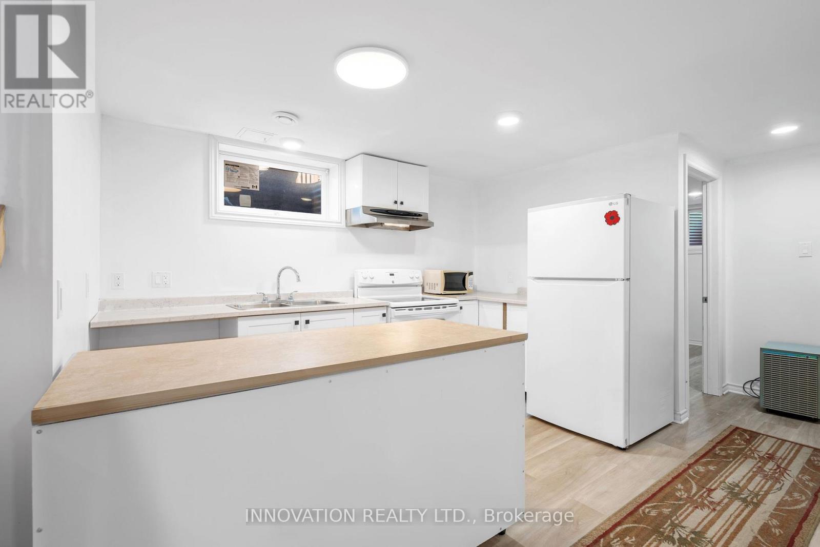 Lower Level - 1263 Maitland Avenue, Ottawa, ON - Indoor Photo Showing Kitchen With Double Sink