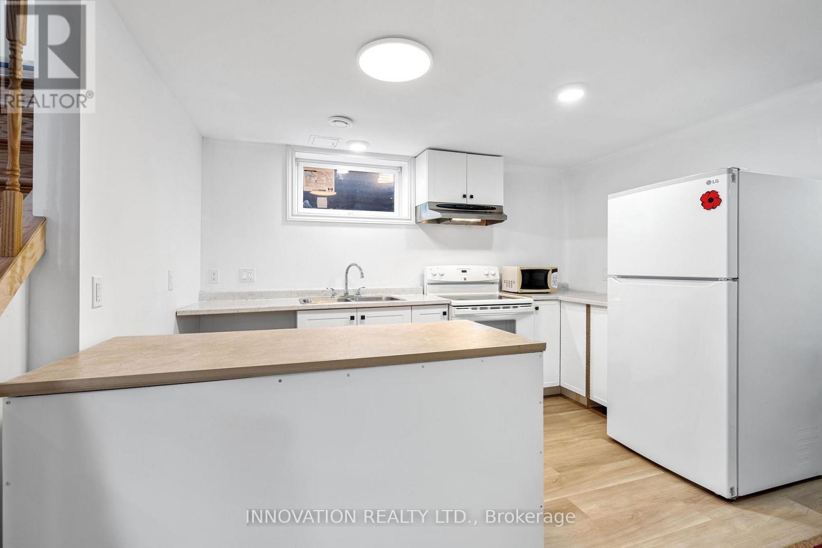 Lower Level - 1263 Maitland Avenue, Ottawa, ON - Indoor Photo Showing Kitchen With Double Sink