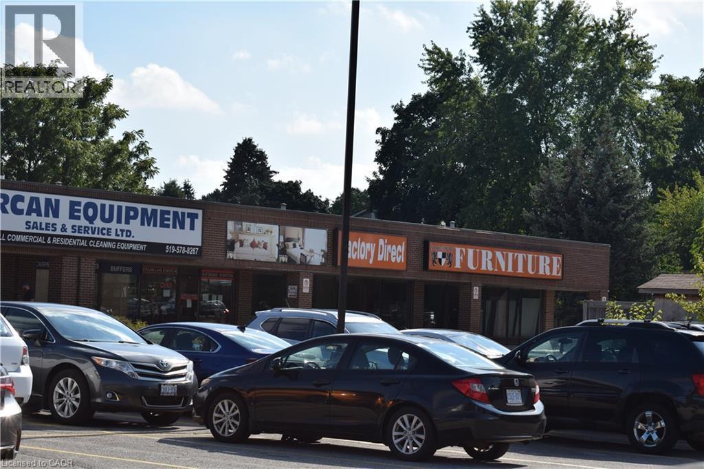 View of uncovered parking lot - 1151 Victoria Street N Unit# 8, Kitchener, ON