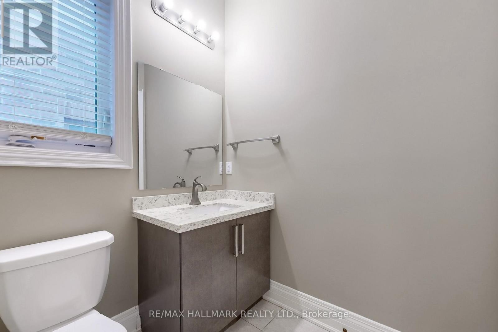 61 Mcisaac Drive, Springwater, ON - Indoor Photo Showing Bathroom