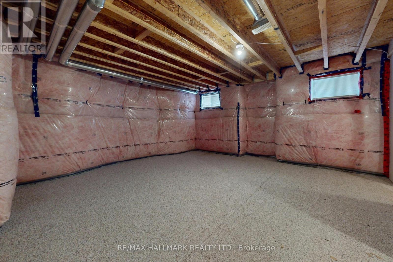 61 Mcisaac Drive, Springwater, ON - Indoor Photo Showing Basement