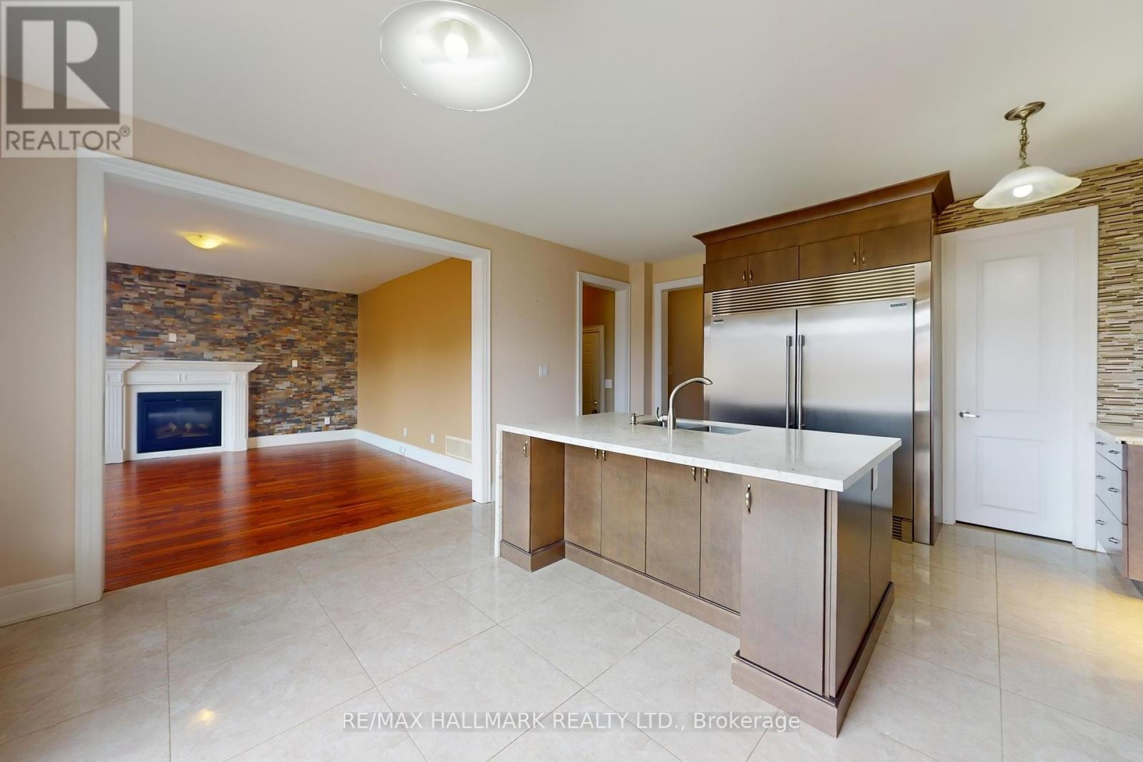 61 Mcisaac Drive, Springwater, ON - Indoor Photo Showing Other Room With Fireplace