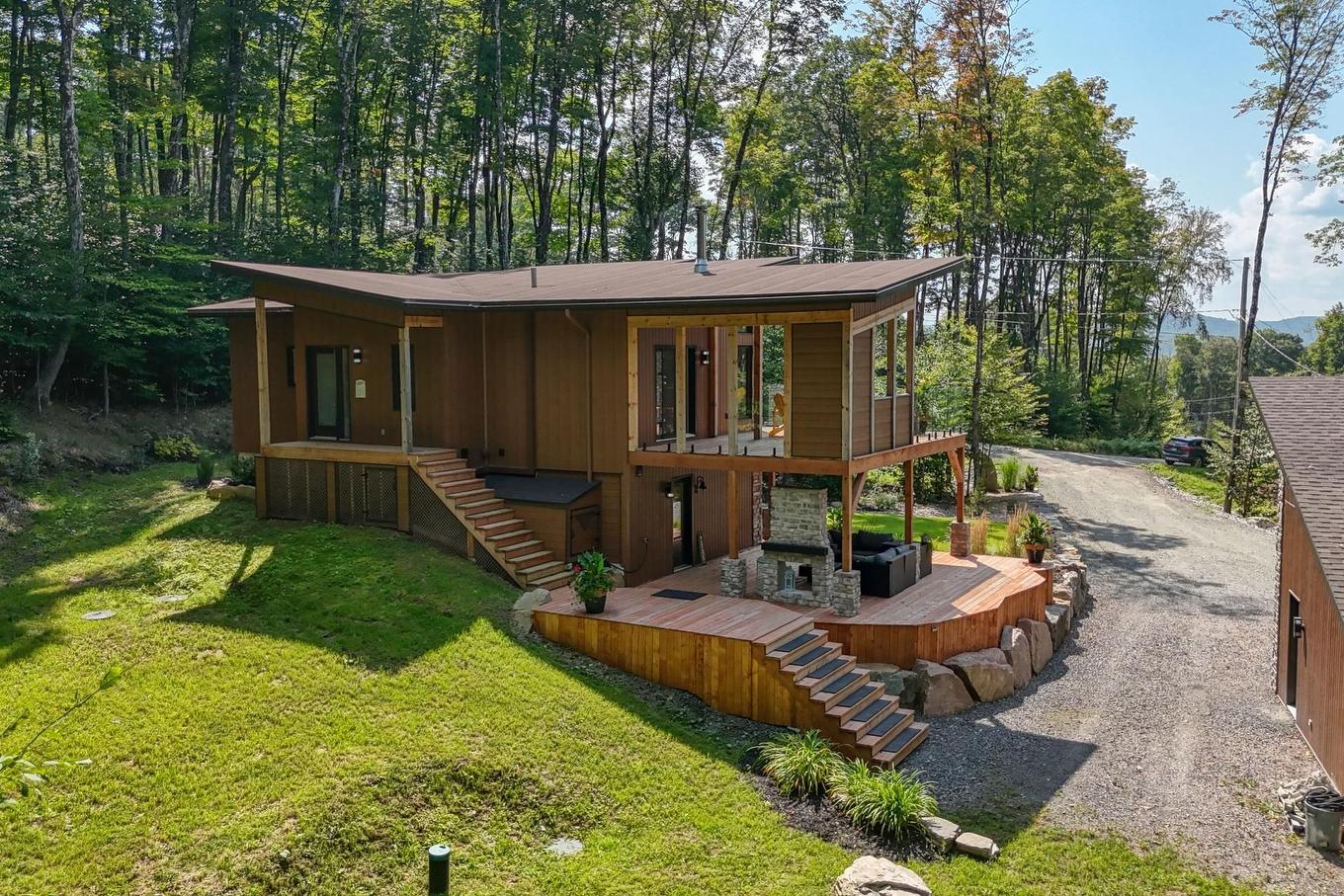 Aerial photo - 125 Allée Des Weskarinis, Mont-Tremblant, QC - Outdoor With Deck Patio Veranda