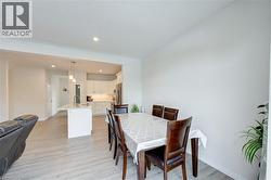 Dining space featuring recessed lighting and light wood-type flooring -