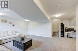 Living area with carpet flooring -