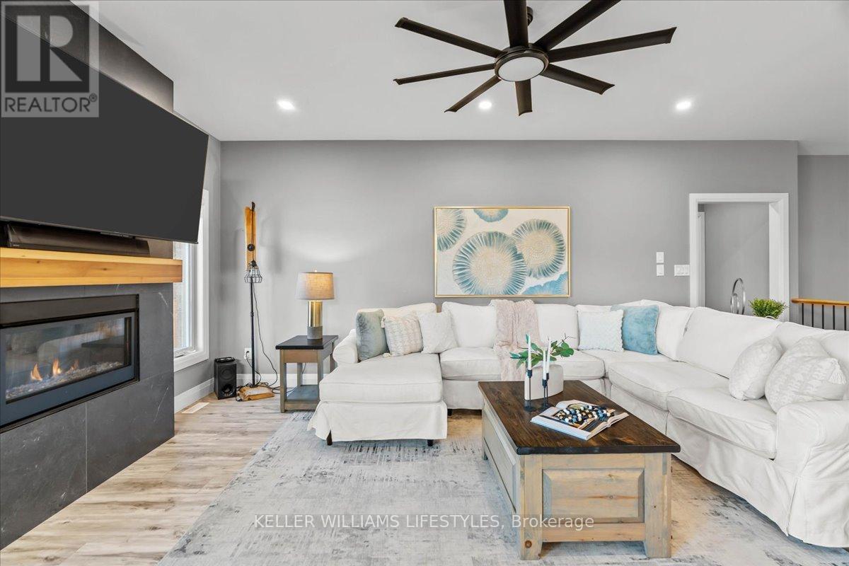92 Queen Street, North Middlesex (Ailsa Craig), ON - Indoor Photo Showing Living Room With Fireplace