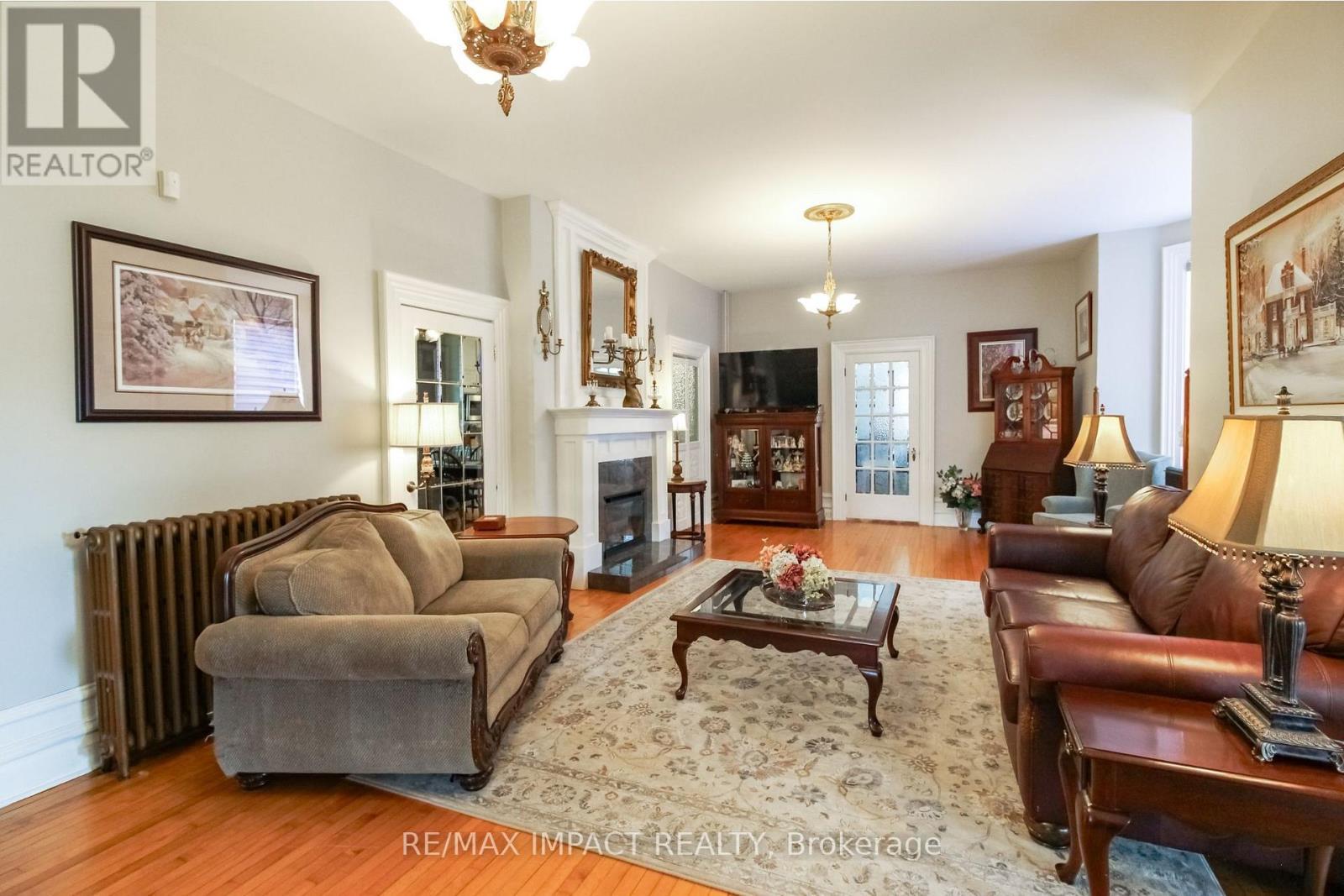 33 Division Street, Cramahe (Colborne), ON - Indoor Photo Showing Living Room With Fireplace