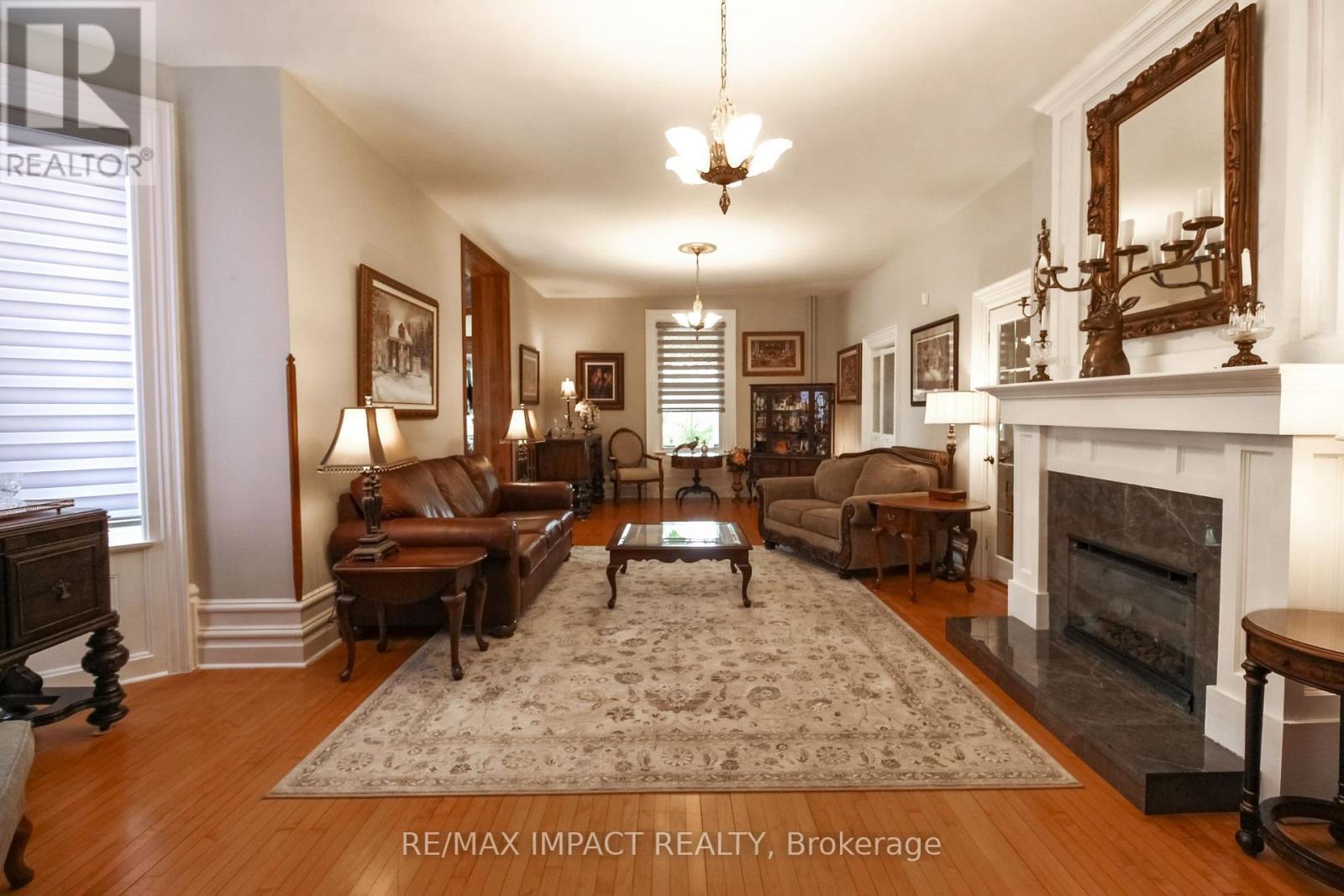 33 Division Street, Cramahe (Colborne), ON - Indoor Photo Showing Living Room With Fireplace
