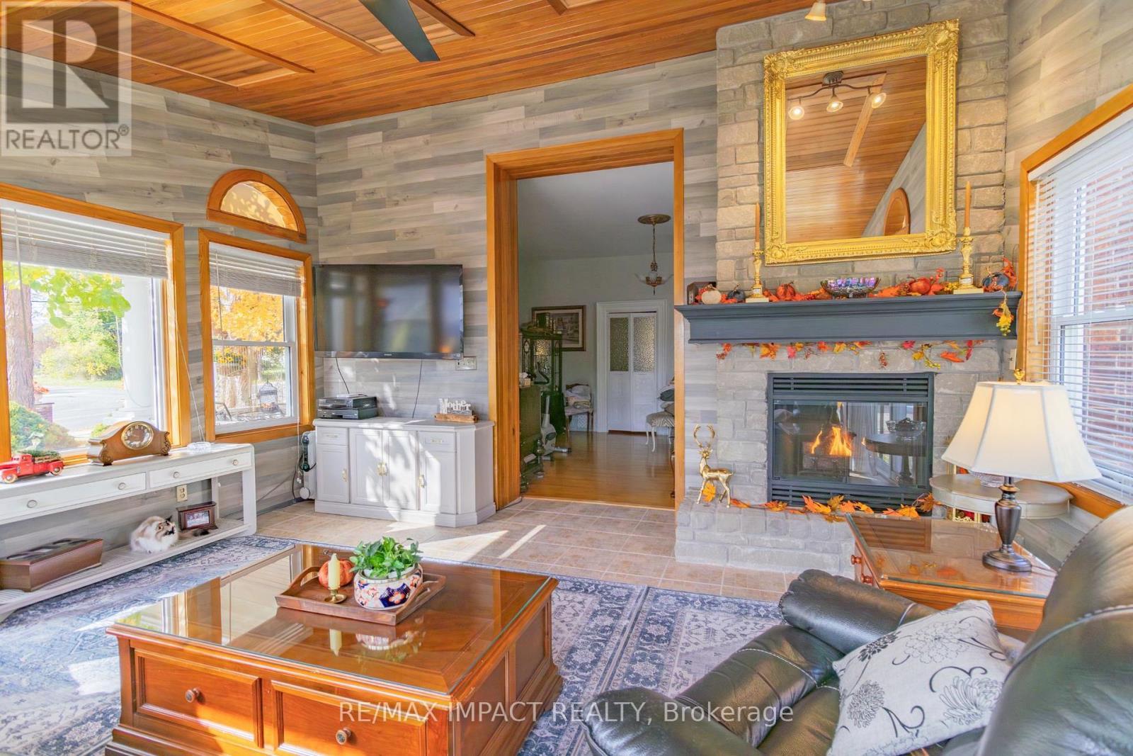 33 Division Street, Cramahe (Colborne), ON - Indoor Photo Showing Living Room With Fireplace