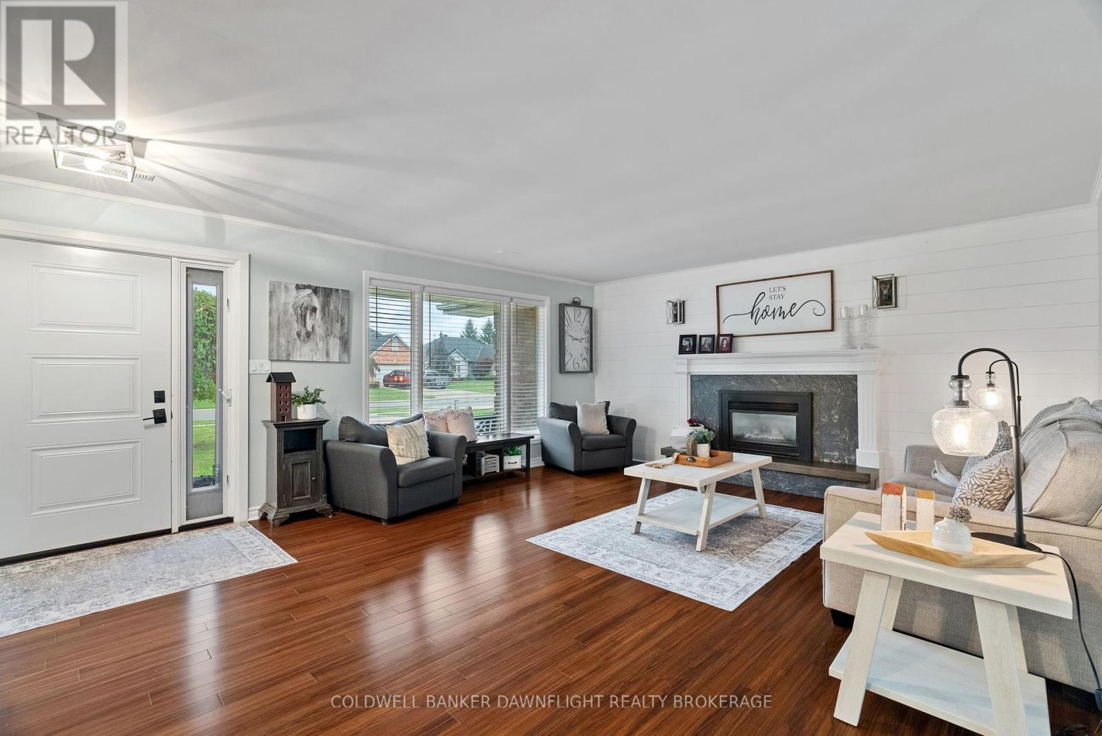 399 Pryde Boulevard, South Huron (Exeter), ON - Indoor Photo Showing Living Room With Fireplace