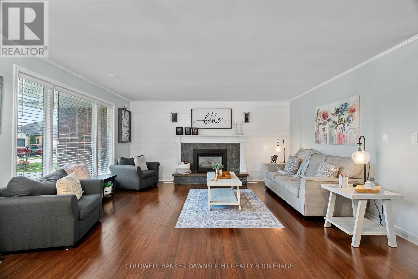 399 Pryde Boulevard, South Huron (Exeter), ON - Indoor Photo Showing Living Room With Fireplace