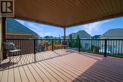 Upper Floor Balcony Overlooking Backyard -