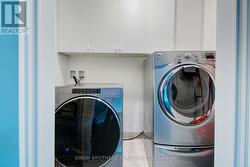Laundry Room with Storage Cabinets -