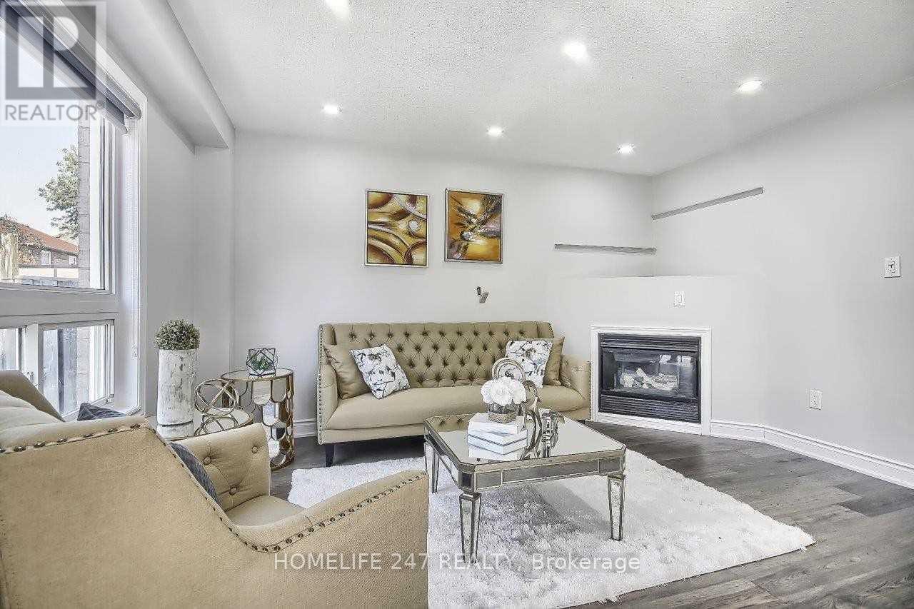 32 Poplar Plains Road, Brampton, ON - Indoor Photo Showing Living Room With Fireplace