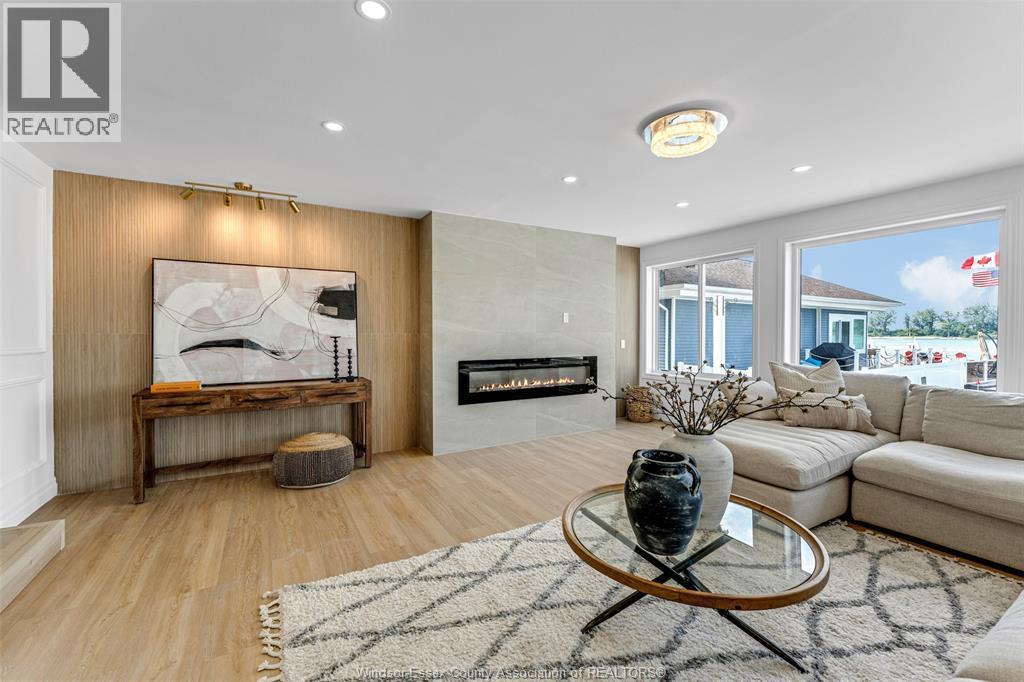 8830 Riverside Drive East, Windsor, ON - Indoor Photo Showing Living Room With Fireplace