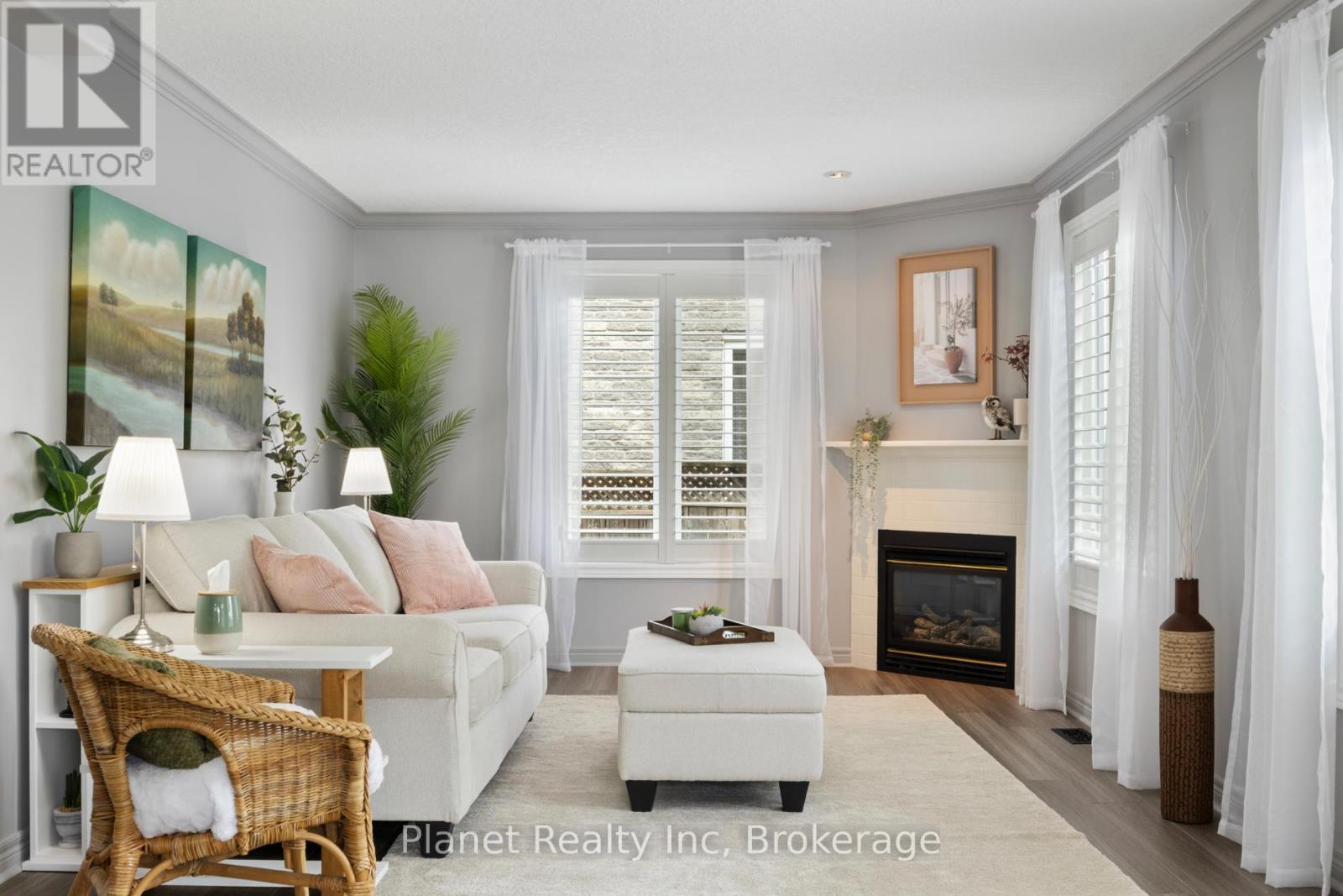 23 Muscovey Drive, Woolwich, ON - Indoor Photo Showing Living Room With Fireplace
