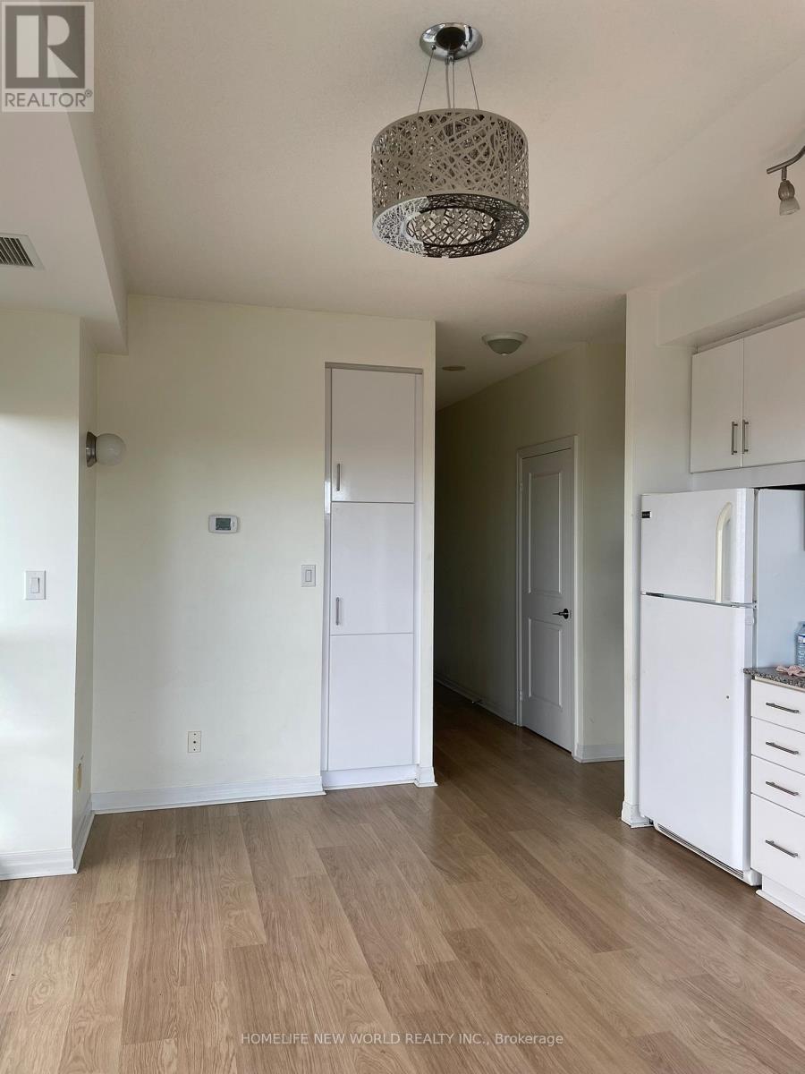 Dining Area - 1905 - 30 Heron'S Hill Way, Toronto, ON - Indoor Photo Showing Kitchen
