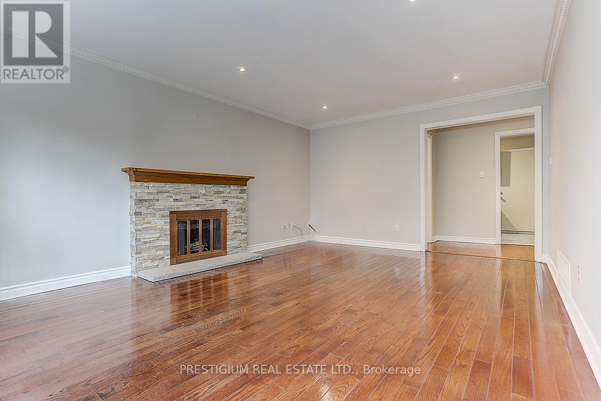 61 Addington Square, Markham, ON - Indoor Photo Showing Living Room With Fireplace