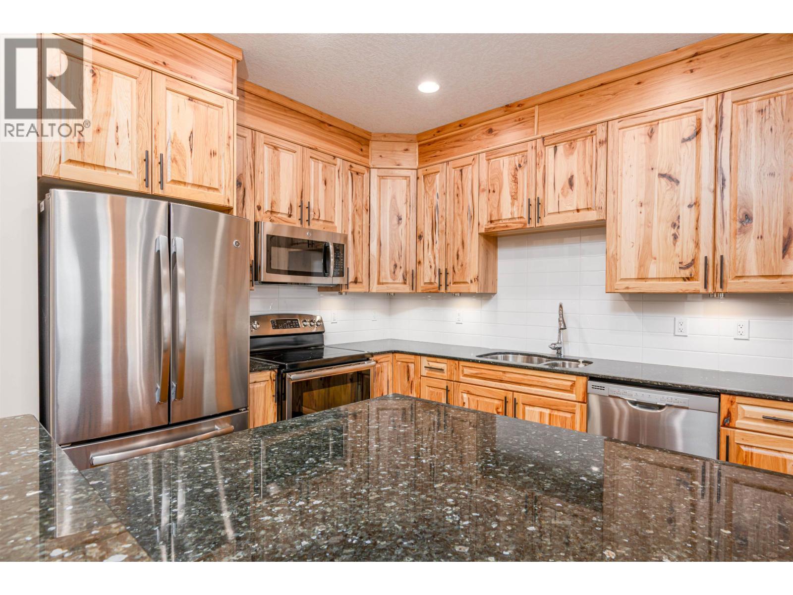 304 4251 Guest Crescent, Prince George, BC - Indoor Photo Showing Kitchen With Stainless Steel Kitchen