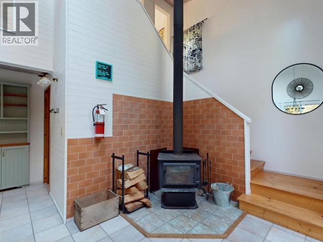 2742 Vancouver Blvd, Savary Island, BC - Indoor Photo Showing Other Room With Fireplace