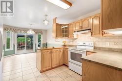Kitchen with a view of the backyard -