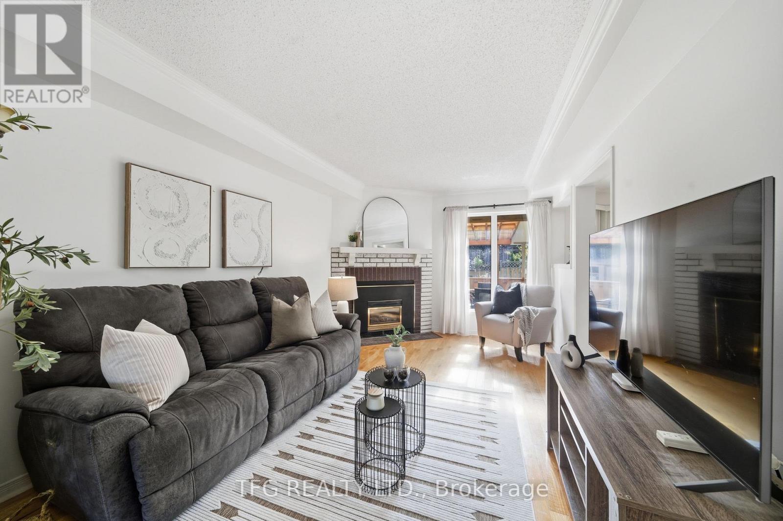 705 Carlisle Street, Cobourg, ON - Indoor Photo Showing Living Room With Fireplace