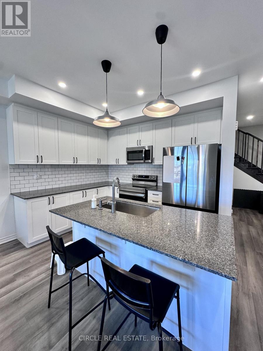 70 - 1317 Leriche Way, Milton, ON - Indoor Photo Showing Kitchen With Double Sink With Upgraded Kitchen