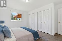 Main floor Primary Bedroom virtually staged -