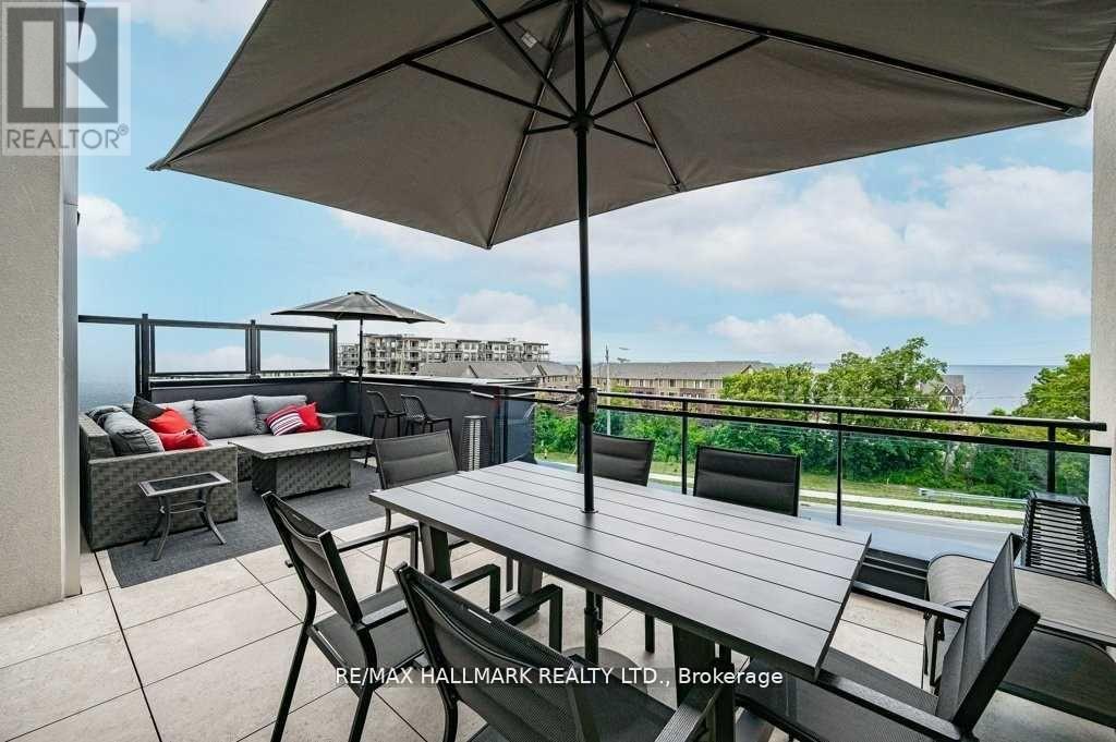 409 - 10 Concord Place, Grimsby, ON - Outdoor With Deck Patio Veranda With View With Exterior
