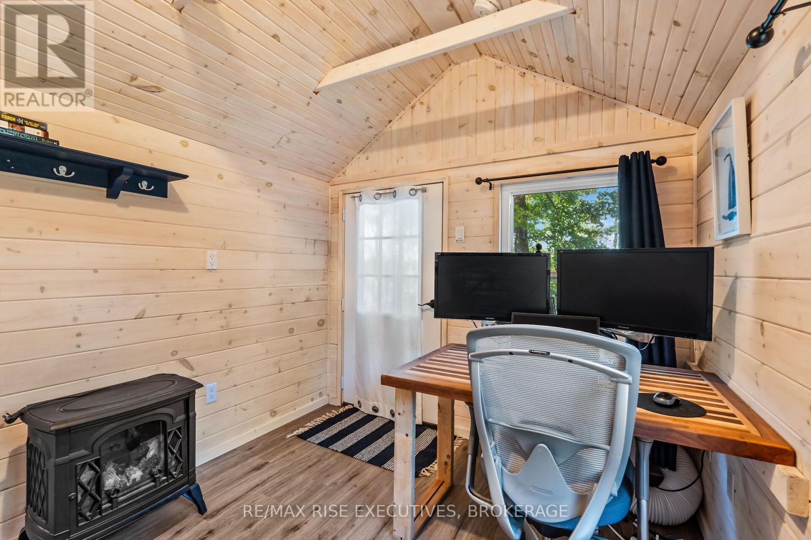 465K Lyndhurst Road, Leeds And The Thousand Islands, ON - Indoor Photo Showing Office With Fireplace