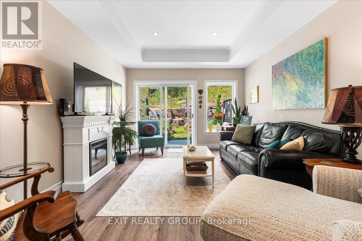 20 Gladstone Street, Madoc, ON - Indoor Photo Showing Living Room With Fireplace