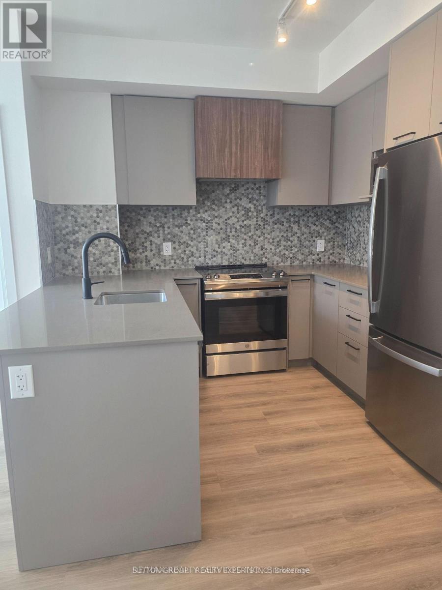 203 - 10 Lagerfeld Drive, Brampton, ON - Indoor Photo Showing Kitchen With Upgraded Kitchen