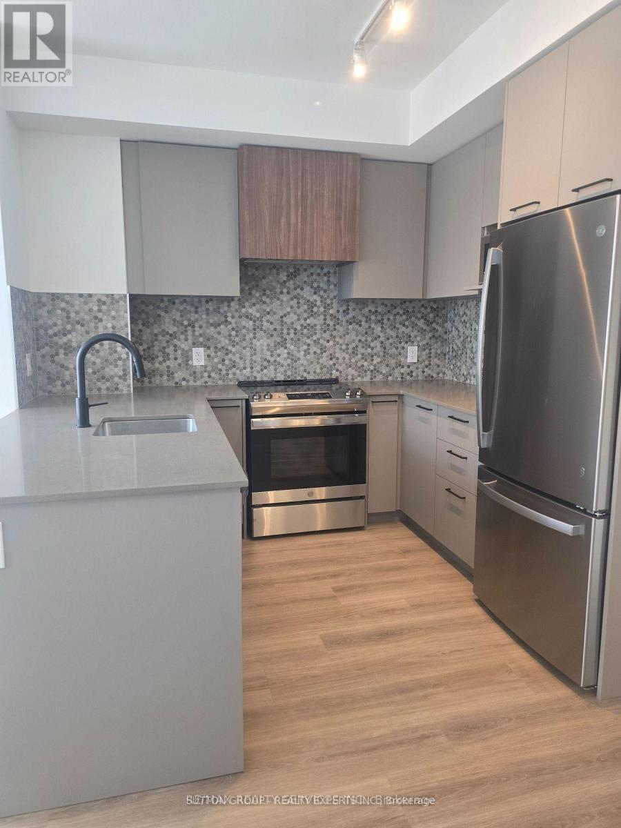 203 - 10 Lagerfeld Drive, Brampton, ON - Indoor Photo Showing Kitchen With Upgraded Kitchen