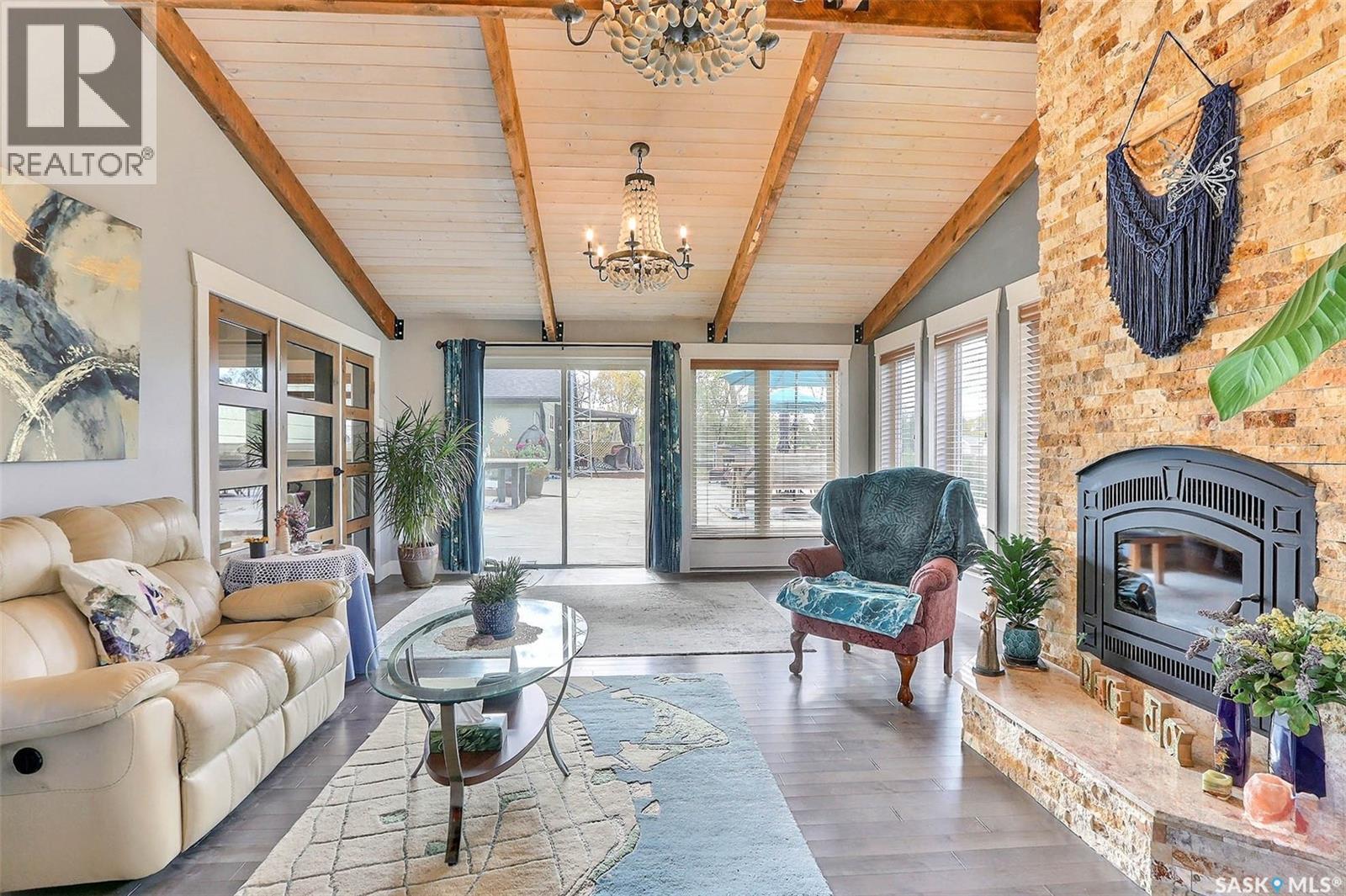 6111 Madden Place, Buckland Rm No. 491, SK - Indoor Photo Showing Living Room With Fireplace