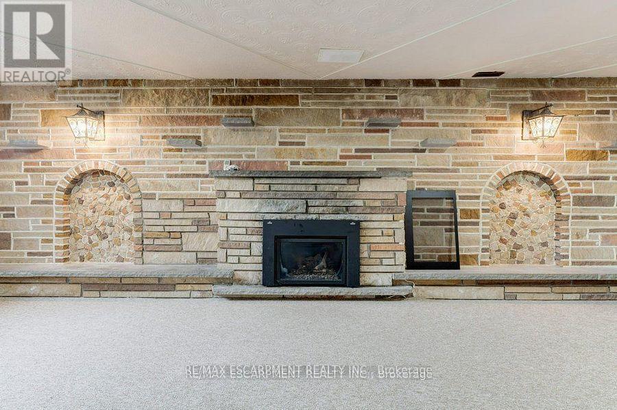 595 Green Mountain Road E, Hamilton, ON - Indoor Photo Showing Other Room With Fireplace