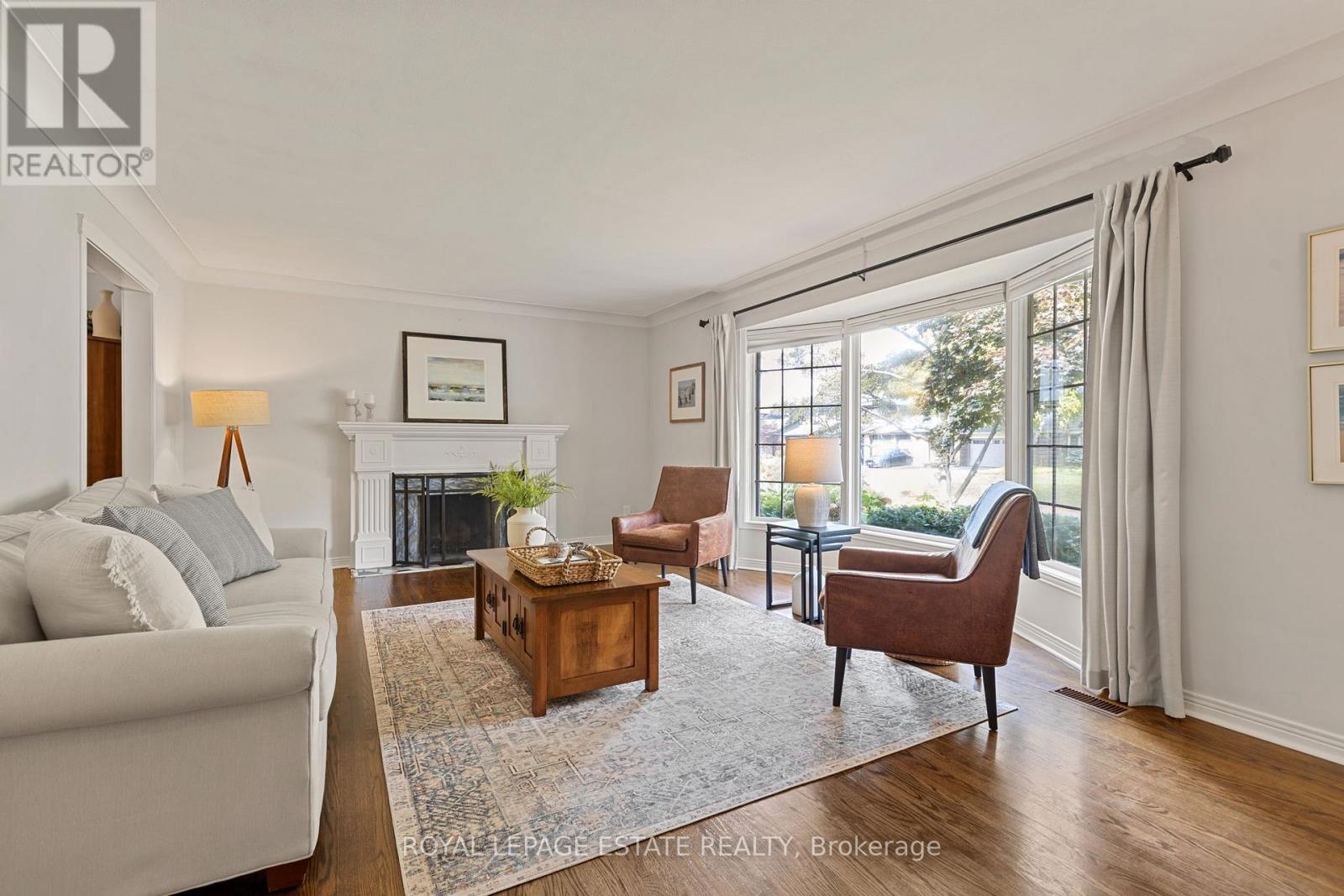 4231 Dunvegan Road, Burlington, ON - Indoor Photo Showing Living Room With Fireplace